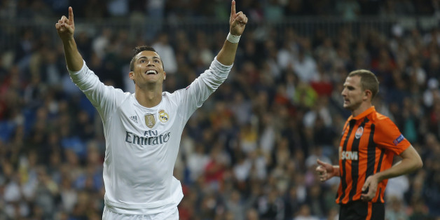 Real Madrid's Cristiano Ronaldo celebrates scoring his side's 3rd goal during a Group A Champions League soccer match between Real Madrid and Shakhtar Donetsk at the Santiago Bernabeu stadium in Madrid, Spain, Tuesday, Sept. 15, 2015. (AP Photo/Francisco Seco)