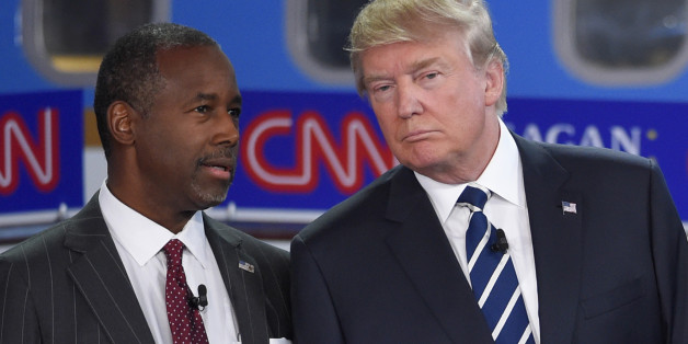 Republican presidential candidates Ben Carson, left, and Donald Trump talk before the start of the CNN Republican presidential debate at the Ronald Reagan Presidential Library and Museum on Wednesday, Sept. 16, 2015, in Simi Valley, Calif. (AP Photo/Mark J. Terrill)