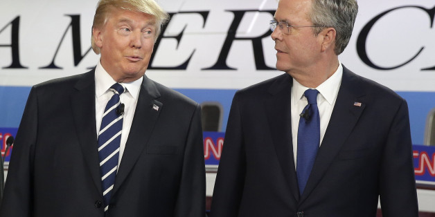Republican presidential candidates, businessman Donald Trump, left, and former Florida Gov. Jeb Bush talk together before the start of the CNN Republican presidential debate at the Ronald Reagan Presidential Library and Museum on Wednesday, Sept. 16, 2015, in Simi Valley, Calif. (AP Photo/Chris Carlson)