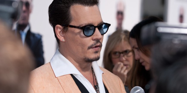 BROOKLINE, MA - SEPTEMBER 15: Actor Johnny Depp arrives on the red carpet for the Boston premiere of 'Black Mass' at Coolidge Theater on September 15, 2015 in Brookline, Massachusetts. (Photo by Eric Frazer/FilmMagic)