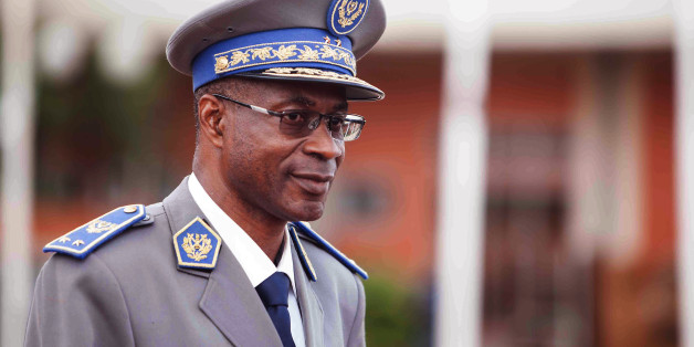 Burkina Faso Gen. Gilbert Diendere waits for Senegal President Macky Sall to arrive at the airport for talks in Ouagadougou, Burkina Faso, Friday, Sept. 18, 2015. Gen. Gilbert Diendere â a former top aide to Compaore who was named on Thursday as the country's military leader â says he already has met with some members of the international community to establish dialogue and to seek a long-term solution. (AP Photo/Theo Renaut)