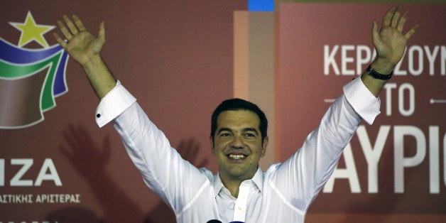 Alexis Tsipras the leader of left-wing Syriza party waves to his supporters after the election results at the partyâs main electoral center in Athens, Sunday, Sept. 20, 2015. Jubilant supporters of Alexis Tsipras' left-wing Syriza party cheered, waved party flags and danced Sunday after the party comfortably won Greece's third national vote this year despite a party rebellion over his acceptance of a painful third international bailout.(AP Photo/Lefteris Pitarakis)