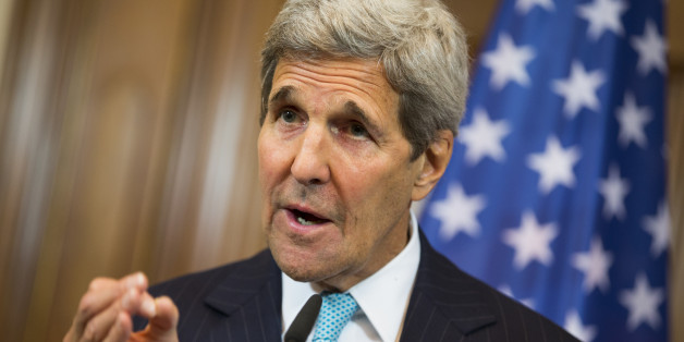 U.S. Secretary of State John Kerry gestures during a news conference with German Foreign Minister Frank-Walter Steinmeier about the ongoing crisis in Syria, at Villa Borsig, Berlin, Sunday, Sept. 20, 2015. (AP Photo/Evan Vucci, Pool)