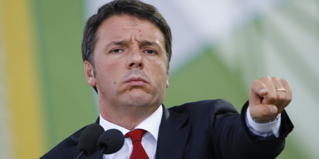 Italian Premier Matteo Renzi gestures as he delivers his speech on the occasion of the Italian Agriculture day, at the Expo world fair in Rho, near Milan, Italy, Tuesday, Sept. 15, 2015. (AP Photo/Luca Bruno)