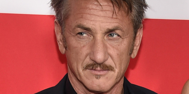 Sean Penn arrives at the Los Angeles premiere of "The Gunman" at Regal Cinemas LA LIVE on Thursday, March 12, 2015. (Photo by Chris Pizzello/Invision/AP)