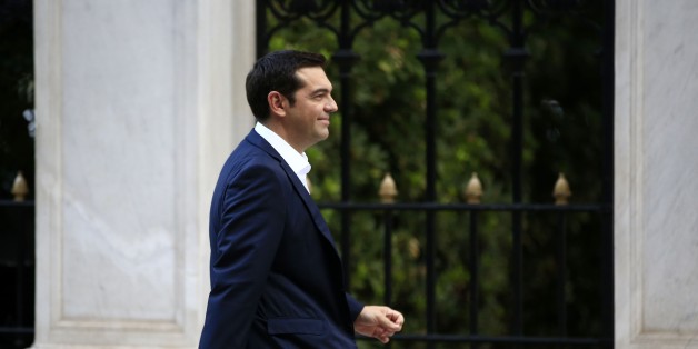 The leader of Syriza left-wing party Alexis Tsipras arrives at the Presidential Palace in Athens, Monday, Sept. 21, 2015. Tsipras received the formal mandate to form a government for the second time this year, after his left-wing Syriza party unexpectedly won a decisive victory in Greek early national elections. (AP Photo/Lefteris Pitarakis)