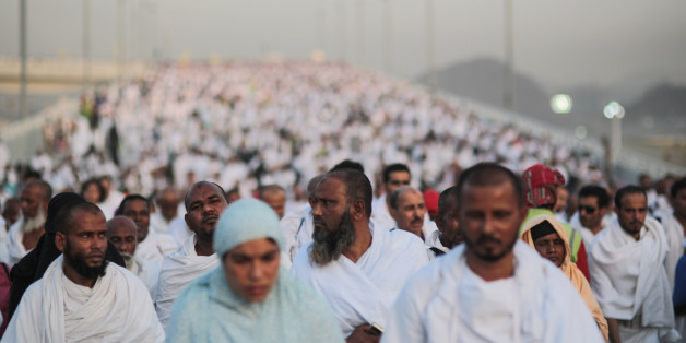 Hundreds of thousands of Muslim pilgrims make their way to cast stones at a pillar symbolizing the stoning of Satan, in a ritual called "Jamarat," the last rite of the annual hajj, on the first day of Eid al-Adha, in Mina near the holy city of Mecca, Saudi Arabia, Thursday, Sept. 24, 2015. Saudi Arabia's civil defense directorate says at least 150 people have been killed in a stampede at the annual hajj pilgrimage. (AP Photo/Mosa'ab Elshamy)