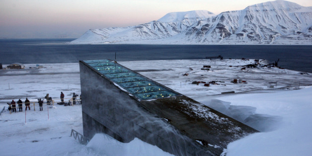 Snow blows off the Svalbard Global Seed Vault before being inaugurated at sunrise, Tuesday, Feb. 26, 2008. The "doomsday" seed vault built to protect millions of food crops from climate change, wars and natural disasters opened Tuesday deep within an Arctic mountain in the remote Norwegian archipelago of Svalbard. (AP Photo/John McConnico)