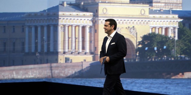 Greek Prime Minister Alexis Tsipras heads to speak at an economic forum in St. Petersburg, Russia, Friday, June 19, 2015. Russia is willing to consider giving financial aid to Greece, a Russian government official said Friday ahead of talks between the leaders of the two countries. (Valery Sharifulin/TASS News Agency Pool Photo via AP)