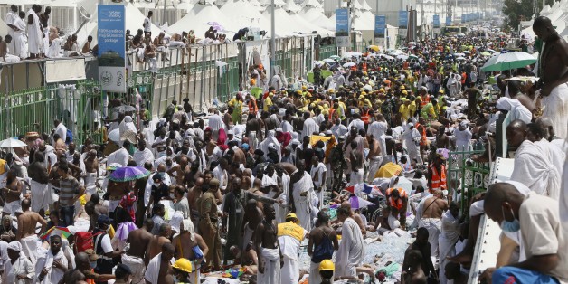 Muslim pilgrims and rescuers gather around people who were crushed by overcrowding in Mina, Saudi Arabia during the annual hajj pilgrimage on Thursday, Sept. 24, 2015. Hundreds were killed and injured, Saudi authorities said. The crush happened in Mina, a large valley about five kilometers (three miles) from the holy city of Mecca that has been the site of hajj stampedes in years past. (AP Photo)