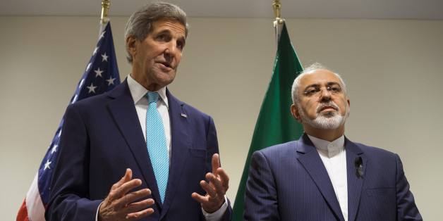 US Secretary of State John Kerry, left, speaks during a meeting with Iranian Foreign Minister Mohammad Javad Zarif at United Nations headquarters Saturday, Sept. 26, 2015. (AP Photo/Craig Ruttle)