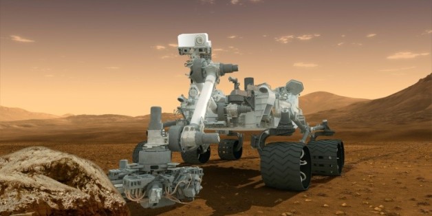 Vue d'artiste fournie par la Nasa le 1er août 2012, qui montre le robot Curiosity, chargé de découvrir des preuves de possibilité de vie sur Mars