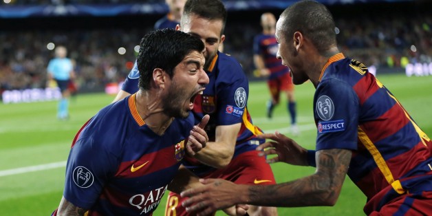 Barcelona's Luis Suarez, left, celebrates with his teammates after scoring the second goal during a Champions League Group E soccer match between Barcelona and Bayer Leverkusen at Camp Nou stadium in Barcelona, Spain, Tuesday, Sept. 29, 2015. (AP Photo/Emilio Morenatti)