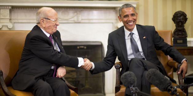 President Barack Obama shakes hands with Tunisian President Beji Caid Essebsi during their meeting in the Oval Office of the White House in Washington, Thursday, May 21, 2015. (AP Photo/Pablo Martinez Monsivais)