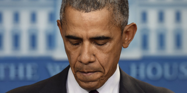 President Barack Obama pauses as he speaks in the Brady Press Briefing Room at the White House in Washington, Thursday, Oct. 1, 2015, about the shooting at the community college in Oregon. The shooting happened at Umpqua Community College in Roseburg, Ore., about 180 miles south of Portland. (AP Photo/Susan Walsh)