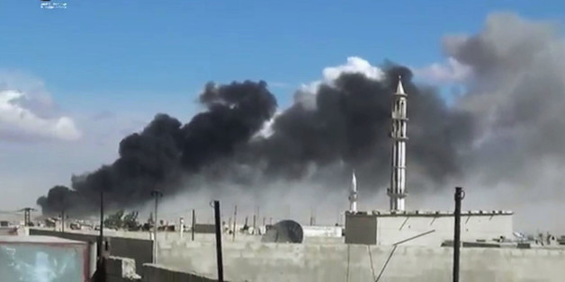 In this image made from video provided by Homs Media Centre, which has been verified and is consistent with other AP reporting, smoke rises after airstrikes by military jets in Talbiseh of the Homs province, western Syria, Wednesday, Sept. 30, 2015. Russian military jets carried out airstrikes in Syria for the first time on Wednesday, targeting what Moscow said were Islamic State positions. U.S. officials and others cast doubt on that claim, saying the Russians appeared to be attacking opposition groups fighting Syrian government forces. (Homs Media Centre via AP)