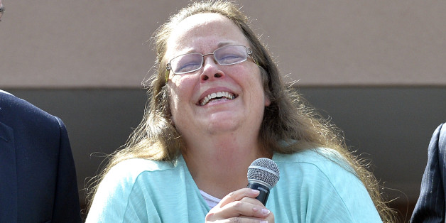 Rowan County Clerk Kim Davis pauses as she speaks after being released from the Carter County Detention Center, Tuesday, Sept. 8, 2015, in Grayson, Ky. Davis, the Kentucky county clerk who was jailed for refusing to issue marriage licenses to gay couples, was released Tuesday after five days behind bars. (AP Photo/Timothy D. Easley)