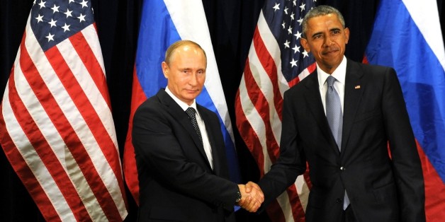 NEW YORK, USA. SEPTEMBER 28,: Russia's President Vladimir Putin (L) and US President Barack Obama shake hands at a meeting after the 70th session of the United Nations General Assembly in New York on September 28, 2015. (Photo by Russian Presidential Press and Information Office/Anadolu Agency/Getty Images)