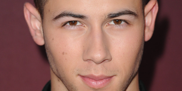 Nick Jonas arrives at the LA premiere screening of "Scream Queens" on Monday, Sept. 21, 2015, at the Wilshire Ebell Theatre in Los Angeles. (Photo by Richard Shotwell/Invision/AP)