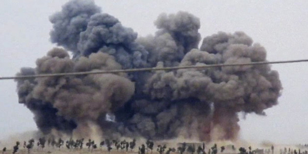 FILE - In this Thursday, Oct. 1, 2015 file image made from video provided by Hadi Al-Abdallah, which has been verified and is consistent with other AP reporting, smoke rises after airstrikes in Kafr Nabel of the Idlib province, western Syria. Russian jets carried out a second day of airstrikes in Syria Thursday, but there were conflicting claims about whether they were targeting Islamic State and al-Qaeda militants or trying to shore up the defenses of President Bashar Assad. (Hadi Al-Abdallah v
