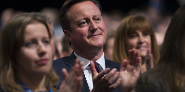 British Prime Minister David Cameron applauds after listening to a speech by Chancellor of the Exchequer George Osborne, during the Conservative Party Conference, in Manchester, England, Monday Oct. 5, 2015. The ruling Conservative Party continue their annual conference on Monday, seemingly buoyant after their electoral triumph in May. (AP Photo/Jon Super)