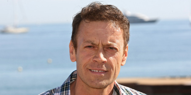 Italian actor, producer, director, Rocco Siffredi poses for photographers during the MIPTV (International Television Programme Market), Tuesday, April 5, 2011, in Cannes, southern France.He celebrates the 5th anniversary of the XXX tv channel "Dorcel TV". (AP Photo/Lionel Cironneau)
