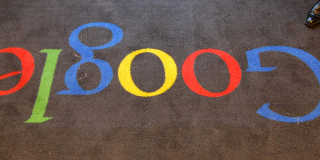FILE - In this Dec.6, 2011 file photo, the Google logo is seen on the carpet at Google France offices before its inauguration, in Paris. Publishers in France, Germany and Italy want their governments to impose a "news tax" on Google to save them from extinction, demanding a law that would charge the search engine small payments in exchange for links to stories. Google, in response, says it will cease to index the sites altogether, warning that the proposals do nothing to solve the industry's problems on the continent that invented the printing press. (AP Photo/Jacques Brinon, Pool, File)