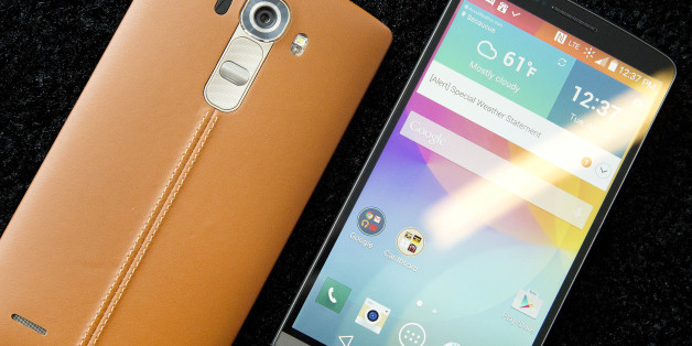 The leather-covered LG G4, left, is displayed next to an LG G3, Tuesday, April 28, 2015 in New York. LG is making smartphones with leather backs as it seeks to distinguish its phones from Apple's iPhones and Samsung's Galaxy smartphones. (AP Photo/Mark Lennihan)