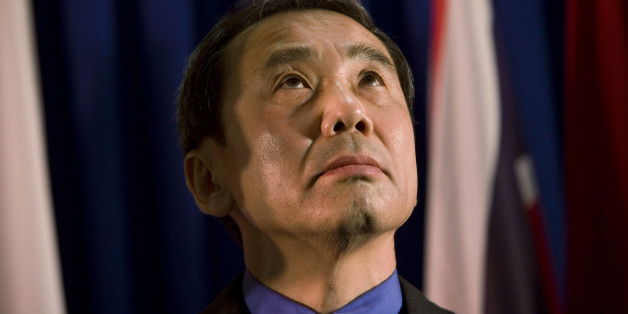 FILE - In this Feb. 15, 2009 file photo, novelist Haruki Murakami of Japan reacts before receiving the Jerusalem award during the International Book Fair in Jerusalem. Murakami said Monday, May 6, 2013 his latest novel was a new experiment and grew longer than expected as he developed a desire to expand on side characters while writing. The latest novel by one of Japan's most respected and popular novelists, "Colorless Tsukuru Tazaki and the Year of His Pilgrimage," has sold more than 1 million