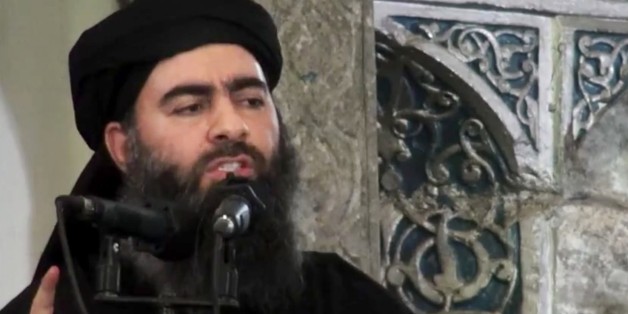 FILE - This file image made from video posted on a militant website Saturday, July 5, 2014, which has been authenticated based on its contents and other AP reporting, purports to show the leader of the Islamic State group, Abu Bakr al-Baghdadi, delivering a sermon at a mosque in Iraq during his first public appearance. An online image released Wednesday purported to show the Islamic State affiliate in Egypt had beheaded a Croatian hostage. (AP Photo/Militant video, File)