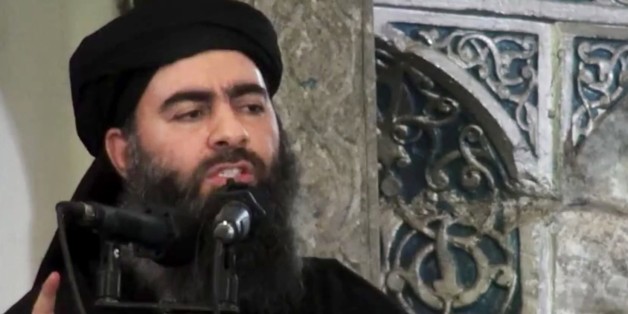 FILE - This file image made from video posted on a militant website Saturday, July 5, 2014, which has been authenticated based on its contents and other AP reporting, purports to show the leader of the Islamic State group, Abu Bakr al-Baghdadi, delivering a sermon at a mosque in Iraq during his first public appearance. An online image released Wednesday purported to show the Islamic State affiliate in Egypt had beheaded a Croatian hostage. (AP Photo/Militant video, File)