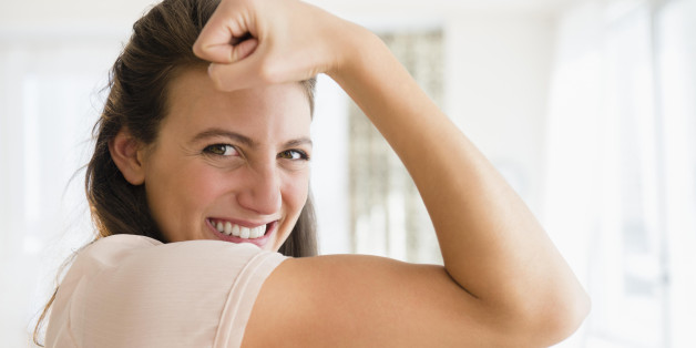 Woman making a muscle