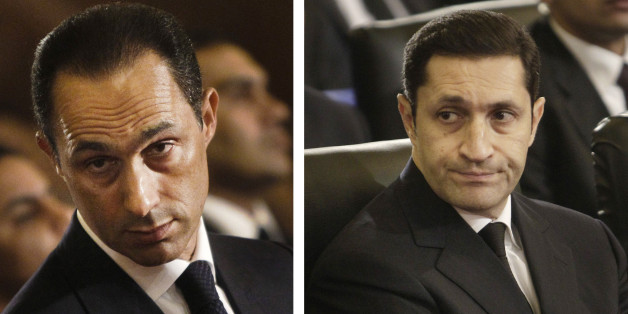 FILE - This combination of Jan. 6, 2011 file images shows Gamal Mubarak, left, and Alaa Mubarak, right, attending a Christmas Eve Mass at the Coptic cathedral in Cairo, Egypt. An Egyptian court on Monday, Oct. 12, 2015, has ordered the release of the sons of deposed autocrat Hosni Mubarak, Gamal, Mubarak's one-time heir apparent, and his brother Alaa, a wealthy businessman, after time served on a corruption conviction. Their father remains held in a military hospital. (AP Photo/File)