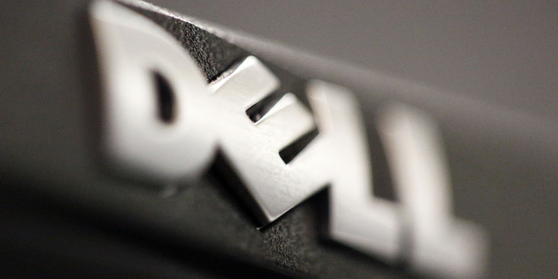 In this Aug. 15, 2011 photo, the logo on a Dell computer is displayed, in Philadelphia. Dell announced Monday, July 3, 2012, that it is buying Quest Software for about $2.36 billion, ending recent speculation about who the unnamed bidder was in a battle for the company with investment firm Insight Venture Partners. (AP Photo/Matt Rourke)