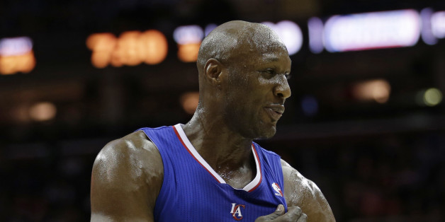 Los Angeles Clippers' Lamar Odom waits during a time-out during an NBA basketball game against the Cleveland Cavaliers Friday, March 1, 2013, in Cleveland. (AP Photo/Tony Dejak)