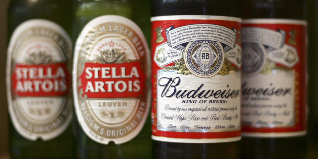 ** FOR USE AS DESIRED WITH YEAR END -- FILE ** In this July 14, 2008 file photo, bottles of Budweiser and Stella Artois beer are seen on display at Dixie Liquors in Washington. (AP Photo/Lawrence Jackson, file)