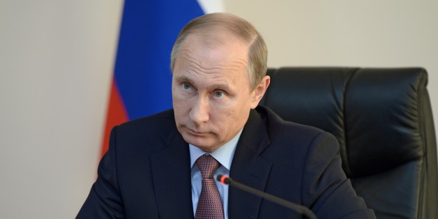 Russian President Vladimir Putin attends a teleconference watching the start of the construction of a Gas Processing plant after visiting the Vostochny Cosmodrome near Uglegorsk, the city in eastern Siberia in the Amur region, Russia, Wednesday, Oct. 14, 2015. Putin has chided officials for a four-month delay in building a sprawling space center in the Far East. (Alexei Nikolsky, RIA-Novosti, Kremlin Pool Photo via AP)