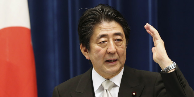 Japanese Prime Minister Shinzo Abe speaks during a press conference at the prime minister's official residence in Tokyo, Wednesday, Oct. 7, 2015. Prime Minister Abe has reshuffled his Cabinet to focus on reviving the world's No. 3 economy. A newly appointed minister will steer programs aimed at achieving a strong economy and increased birth rate so the population stabilizes and the country can stay afloat. (AP Photo/Koji Sasahara)