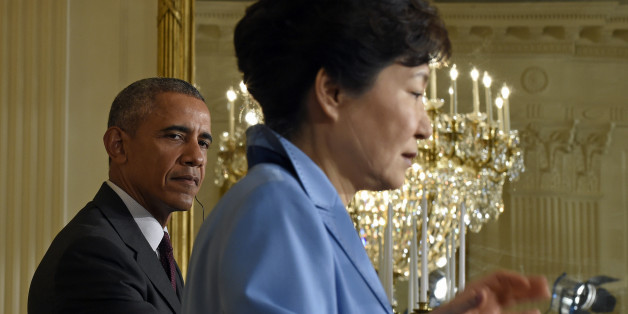 President Barack Obama listens as South Korean President Park Geun-hye speaks during their joint news conference in the East Room of the White House in Washington, Friday, Oct. 16, 2015. (AP Photo/Susan Walsh)