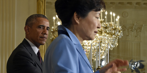 President Barack Obama listens as South Korean President Park Geun-hye speaks during their joint news conference in the East Room of the White House in Washington, Friday, Oct. 16, 2015. (AP Photo/Susan Walsh)
