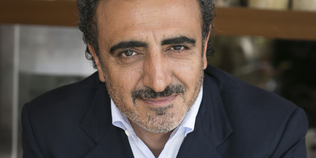 IMAGE DISTRIBUTED FOR CHOBANI, LLC - In this image released on Thursday, May 28, 2015, Chobani's founder and CEO Hamdi Ulukaya at the Chobani Soho café in New York. (Mark Von Holden/AP Images for Chobani, LLC)