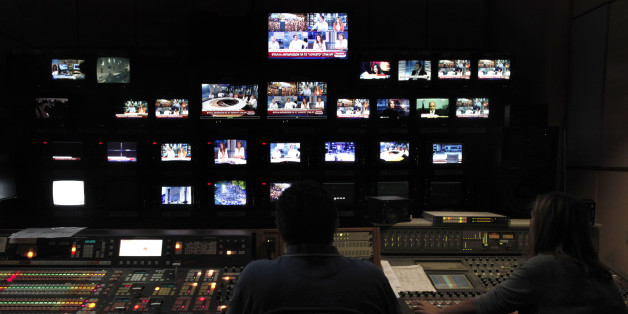 Employees of the Greece state broadcaster ERT in the control room at the television station's headquarters in Athens, on Wednesday, June 12, 2013. Journalists fired from Greeceâs state TV and radio refused to leave the broadcasterâs headquarters, continuing Internet programming, as the countryâs conservative-led government faced political crisis a year after taking office. State TV and radio signals were cut early Wednesday, hours after the government closed the Hellenic Broadcast