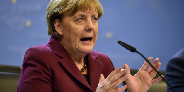 German Chancellor Angela Merkel talks to the media at a press conference after the EU summit in Brussels, Belgium on early Friday, Oct. 16, 2015. European Union heads of state met to discuss, among other issues, the current migration crisis. (AP Photo/Martin Meissner)