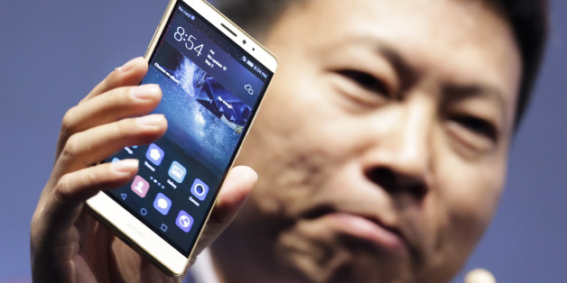 CEO of Huawei Consumer Business Group Richard Yu presents the Huawei Mate S smartphone during a company event ahead of the consumer electronic fair IFA in Berlin, Wednesday, Sept. 2, 2015. Europeâs flagship gadget show, the IFA, opens its doors to the public on Friday, Sept. 4, 2015. Almost 1,500 companies and over 250,000 visitors are expected to attend the event, which runs until Sept. 9. (AP Photo/Markus Schreiber)