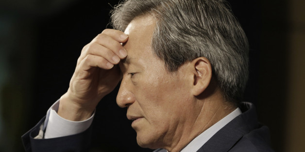 South Korean FIFA presidential candidate Chung Mong-joon pauses to answer questions during a news conference in Seoul, South Korea, Thursday, Sept. 3, 2015. Chung accused the Asian Football Confederation of breaking rules by lobbying for rival candidate Michel Platini in the upcoming FIFA presidential election. Chung said that the AFC has been sending letters to officials of member federations urging them to vote for the Frenchman on Feb. 26. (AP Photo/Ahn Young-joon)