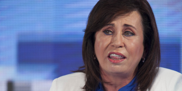 Sandra Torres, the National Unity of Hope party presidential candidate answers questions during a television presidential debate in Guatemala City, Tuesday, Oct. 20, 2015. Voters will head to the polls on Oct. 25 to choose a new leader in a presidential runoff election. Jimmy Morales, the National Front of Convergence party presidential candidate was not present. (AP Photo/Moises Castillo)