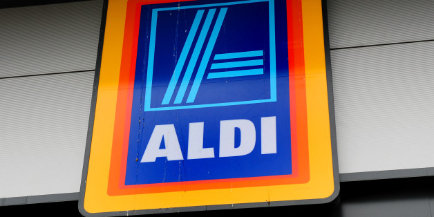 File photo dated 01/08/12 of an Aldi supermarket logo, as the discount retailer has reported a fall in profits as the supermarket price war took its toll on earnings despite sales surging to a new record level.
