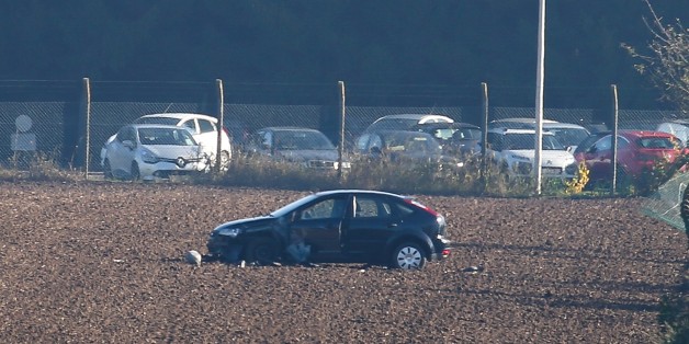 ***BELGIUM OUT***This photo taken on October 26, 2015 shows a damaged car at the army barracks in Flawinne, Namur Province, after a man attempted to drive through the barrack's barriers. According to newspaper La Derniere Heure, gun shots were heard being fired on early October 26. AFP PHOTO / BELGA / BRUNO FAHY (Photo credit should read BRUNO FAHY/AFP/Getty Images)
