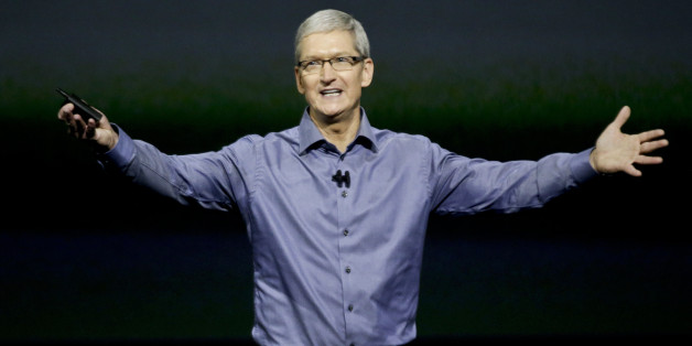 Apple CEO Tim Cook wraps up the latest Apple event at the Bill Graham Civic Auditorium in San Francisco, Wednesday, Sept. 9, 2015. (AP Photo/Eric Risberg)