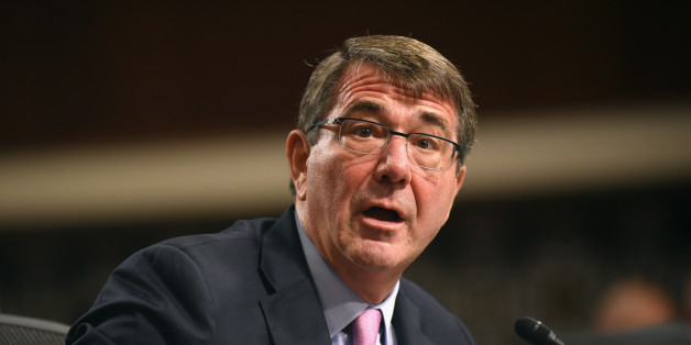 Defense Secretary Ash Carter testifies on Capitol Hill in Washington, Tuesday, Oct. 27, 2015, before the Senate Armed Services Committee. Carter said Tuesday that the U.S. is willing to step up unilateral attacks against Islamic State militants in Iraq or Syria, a signal that the U.S. would escalate American involvement beyond airstrikes by giving the go-ahead for U.S. special operations forces' raids on the ground. (AP Photo/Kevin Wolf)